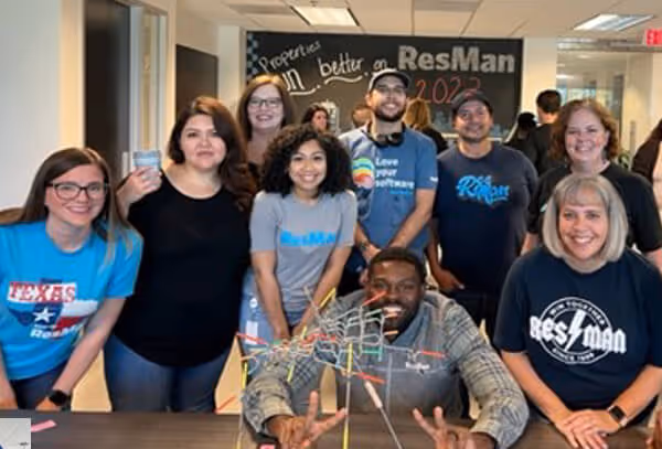 ResMan team members playing a balancing game