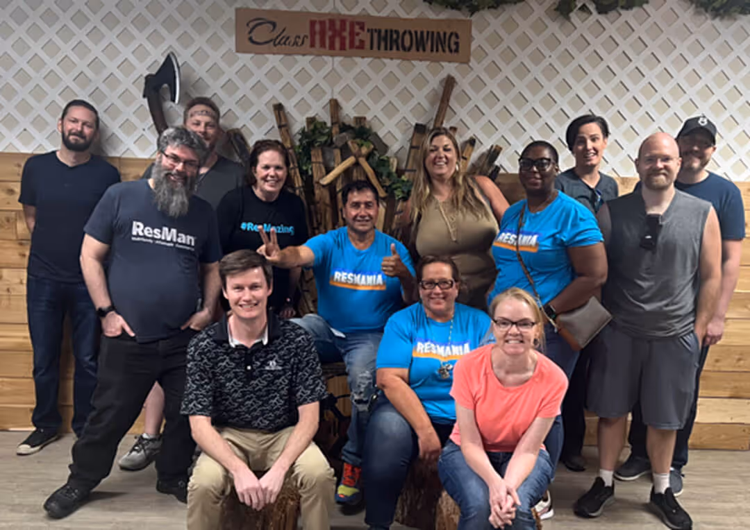 The ResMan team at an axe-throwing team outing