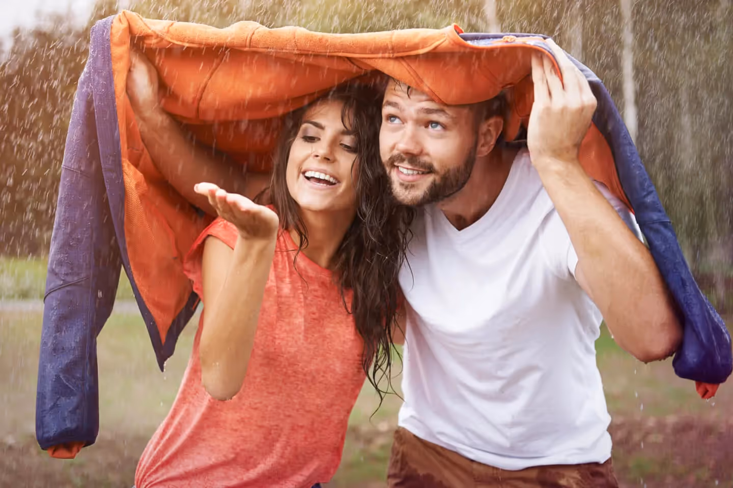 Couple protected from rain