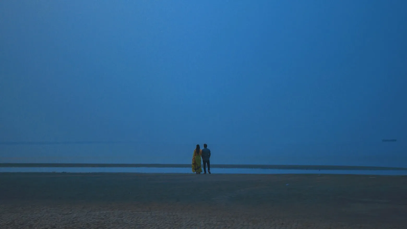 A Couple infront of river
