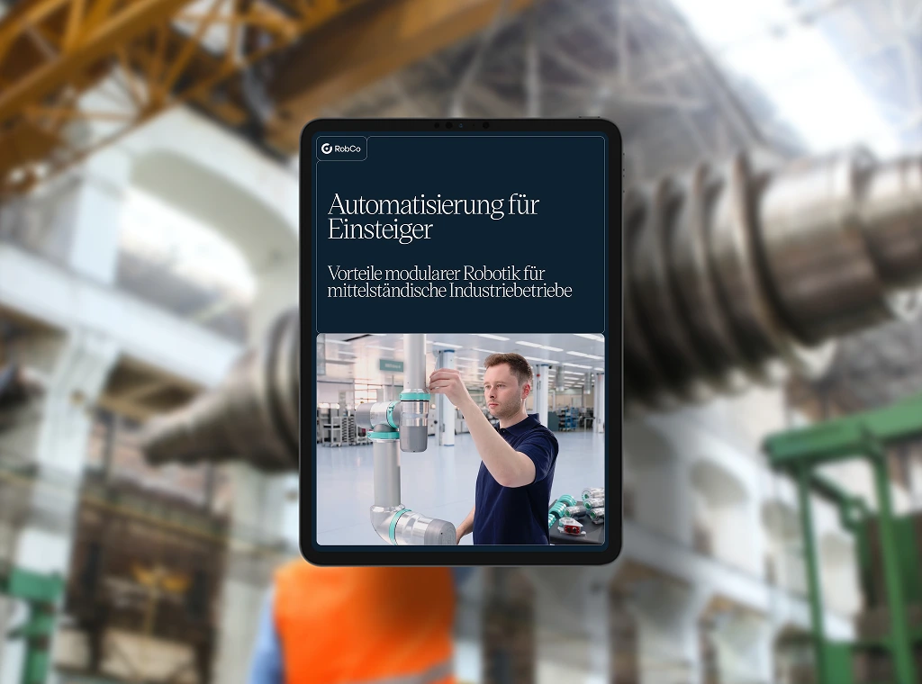 Whitepaper-Mockup mit dem Titel „Automatisierung für Einsteiger“. Hintergrundbild in einer industriellen Umgebung.