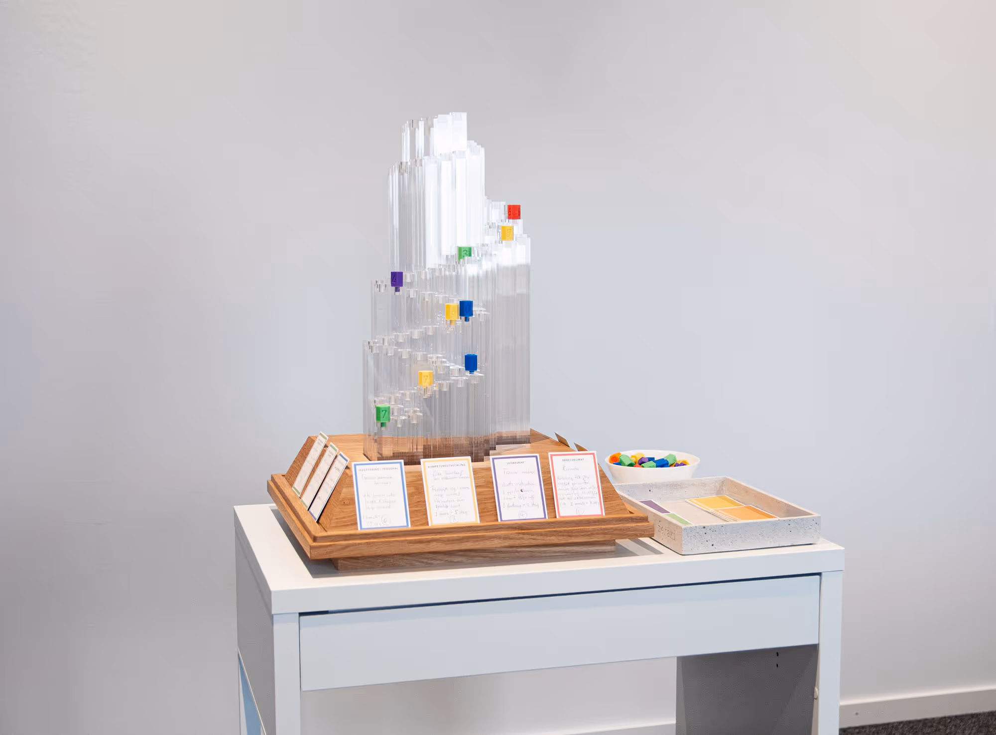 Stig model with cards and pawns