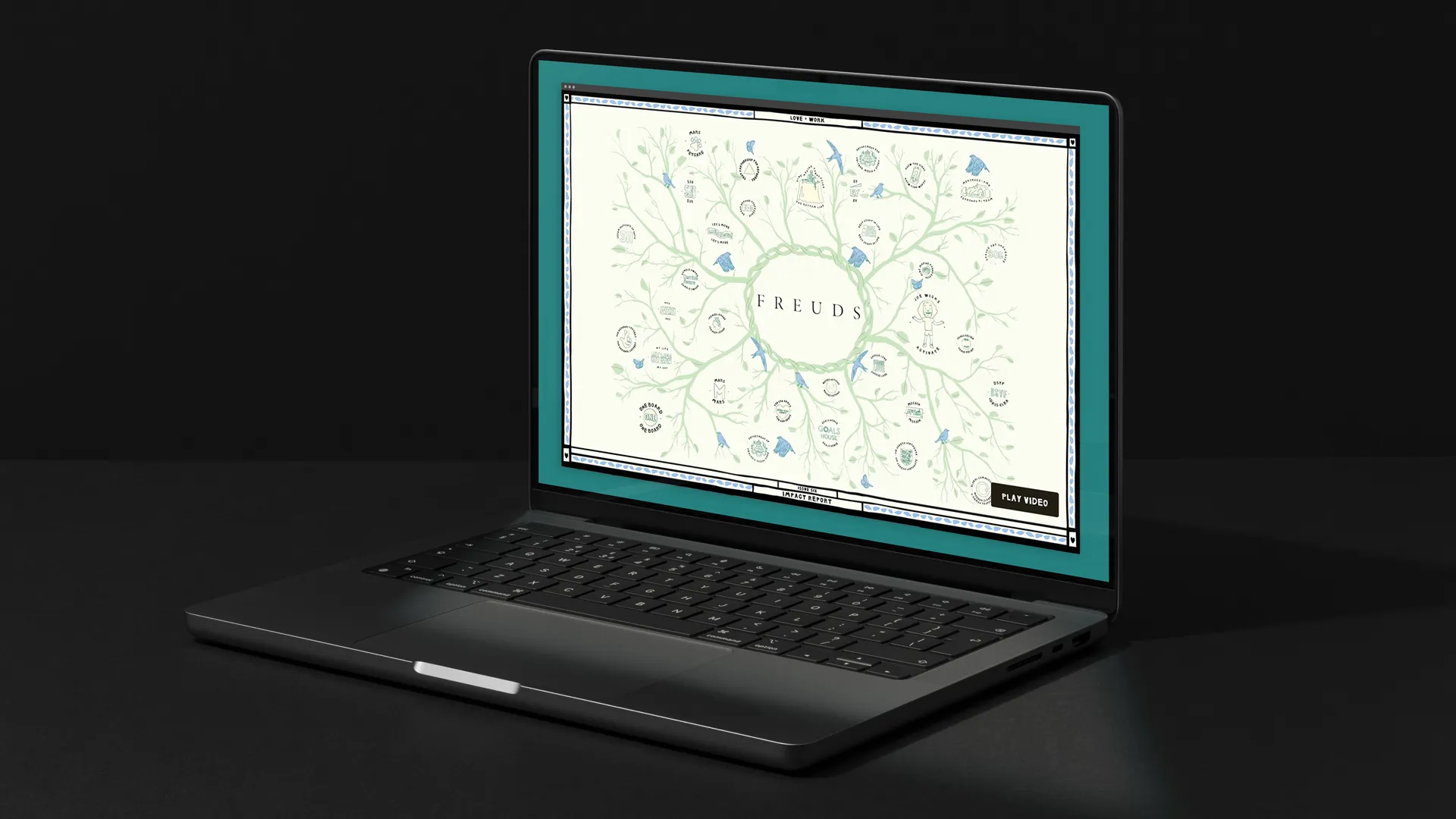 Laptop displaying a digital infographic with a leafy circular design and the word 'FREUDS' at the center.