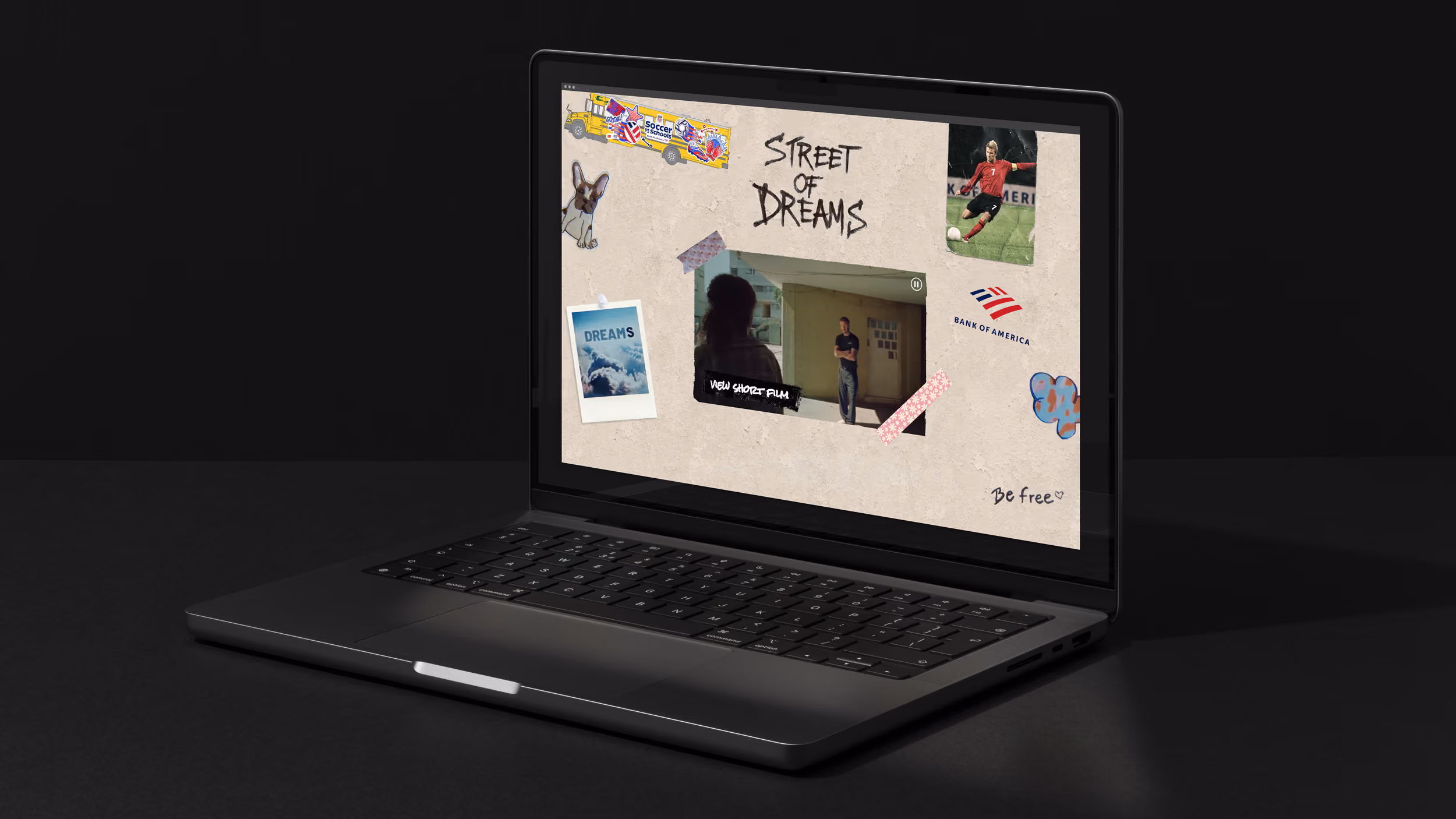 Black laptop displaying 'Street of Dreams' website with video, soccer player, and Bank of America logo.