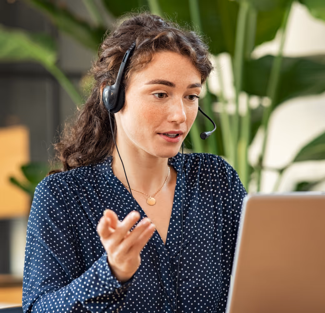 A customer support representative engaging in a detailed discussion with a customer, attentively addressing their situation and needs.