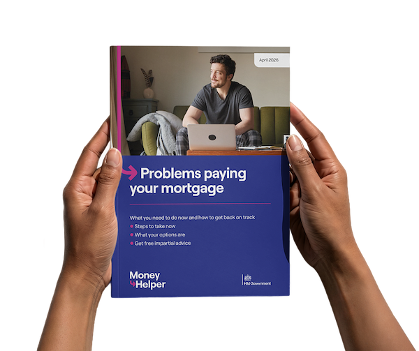 Two hands hold up a copy of the Money Helper booklet, which is available virtually online, serving as a valuable resource for assistance with mortgage concerns.