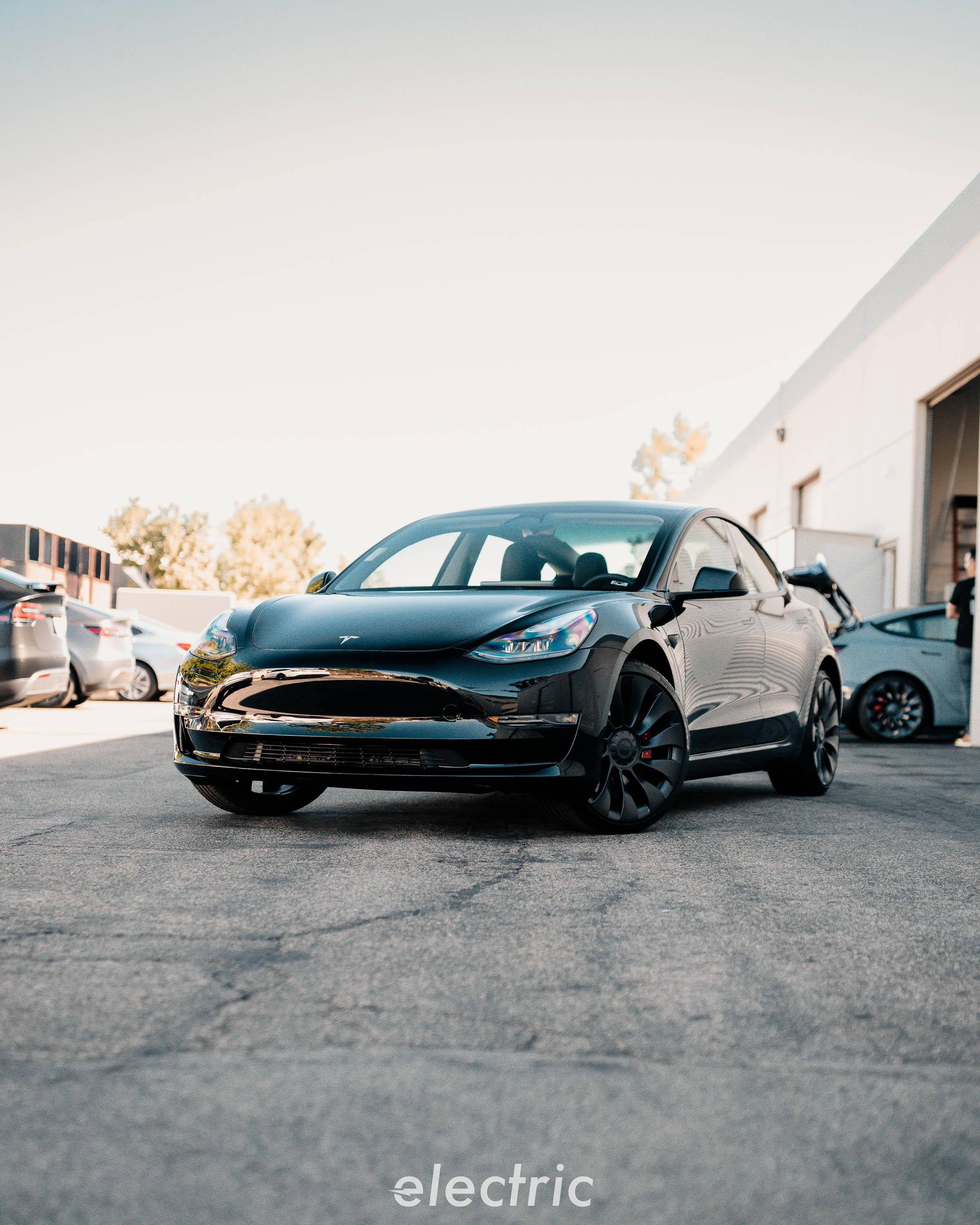 Black Tesla Model 3 with front-end paint protection film