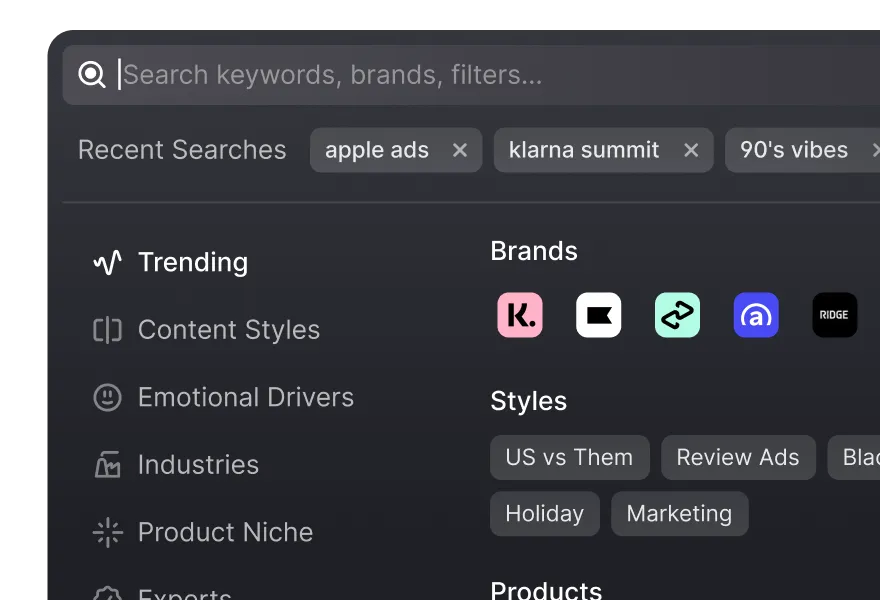 User interface showing a search bar with recent searches tags 'apple ads,' 'klarna summit,' and '90's vibes.' Below are categories: Trending, Content Styles, Emotional Drivers, Industries, Product Niche, and Experts on the left, and Brands and Styles with selectable tags such as US vs Them, Review Ads, Holiday, and Marketing on the right.