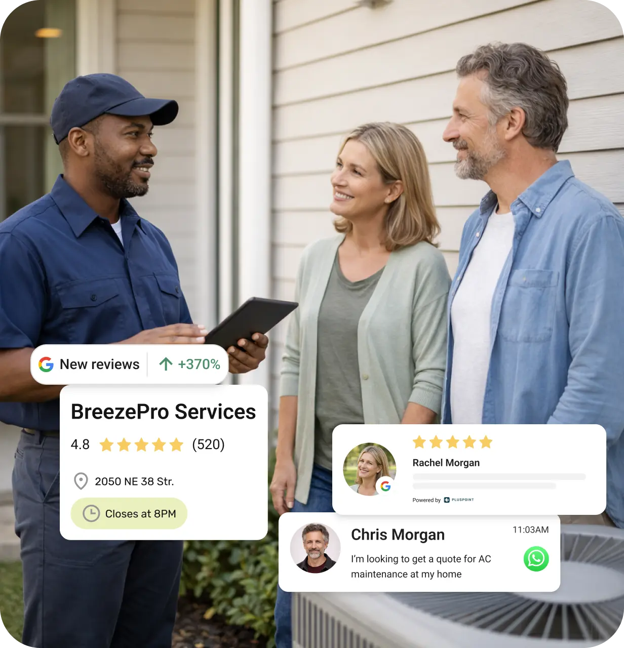 Technician in a navy uniform holding a tablet talks to a smiling couple outside their house near an air conditioning unit.