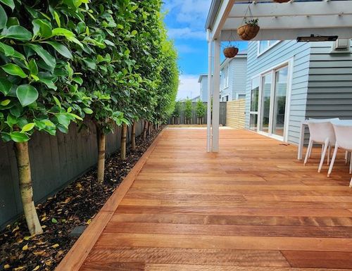 Decking with dark stained timber