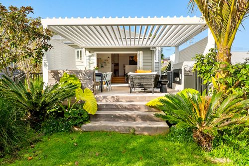 landscape design with waterfall and firepit