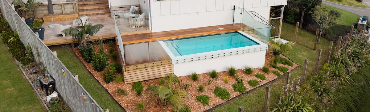 Beautiful backyard with planters, deck and modern landscape design - Rodney Landscape Designers
