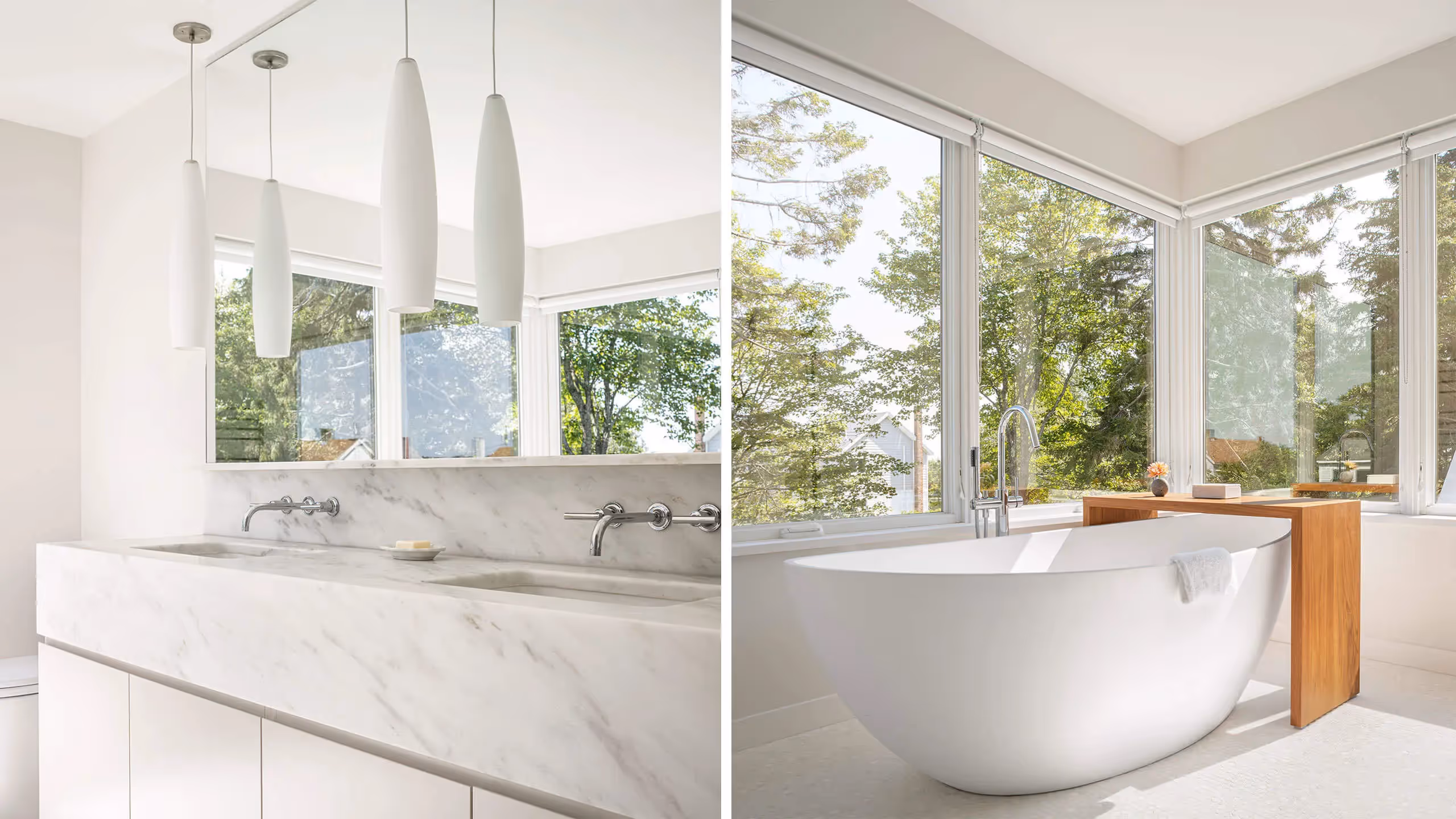 Modern white bathroom with marble sink and freestanding tub, large windows