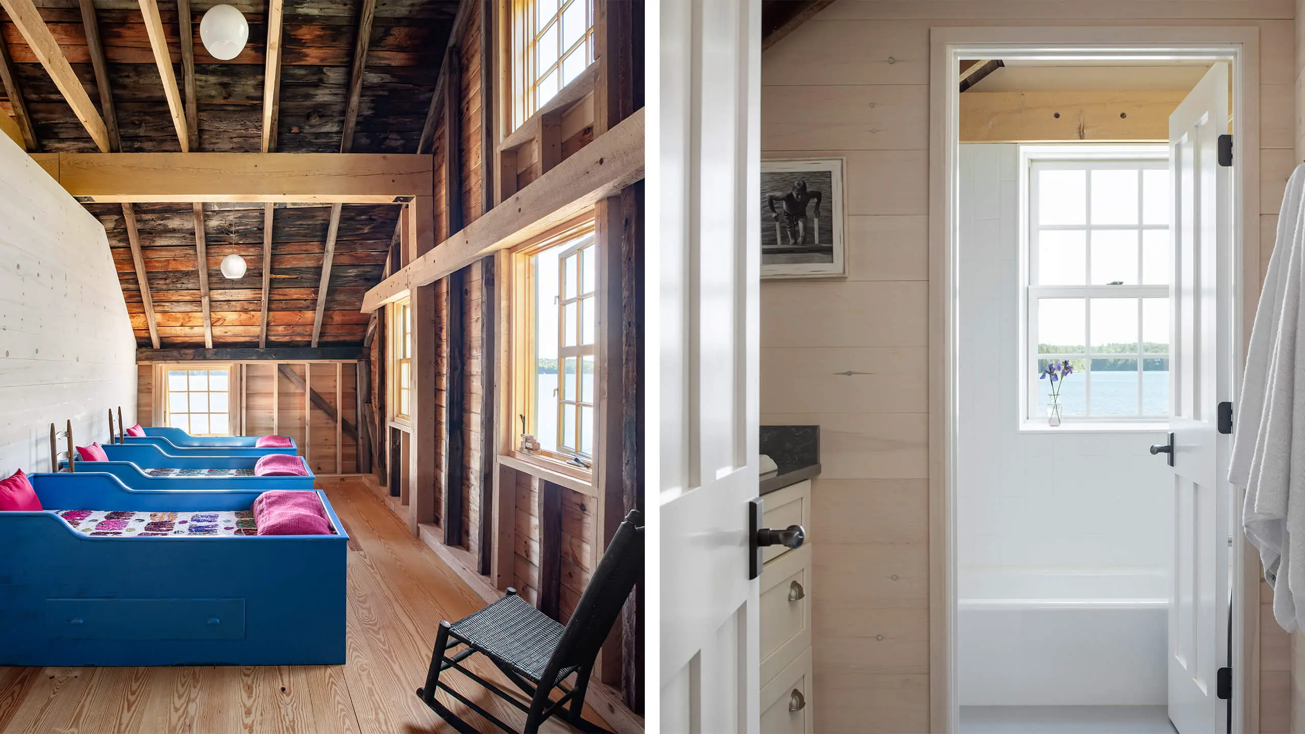 Rustic wooden room with blue beds and exposed beams near water view