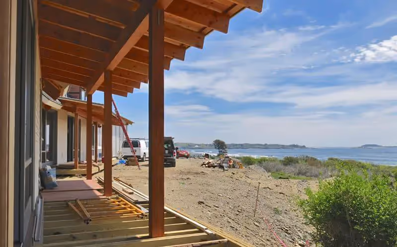 Wooden deck of beach house under construction with ocean view