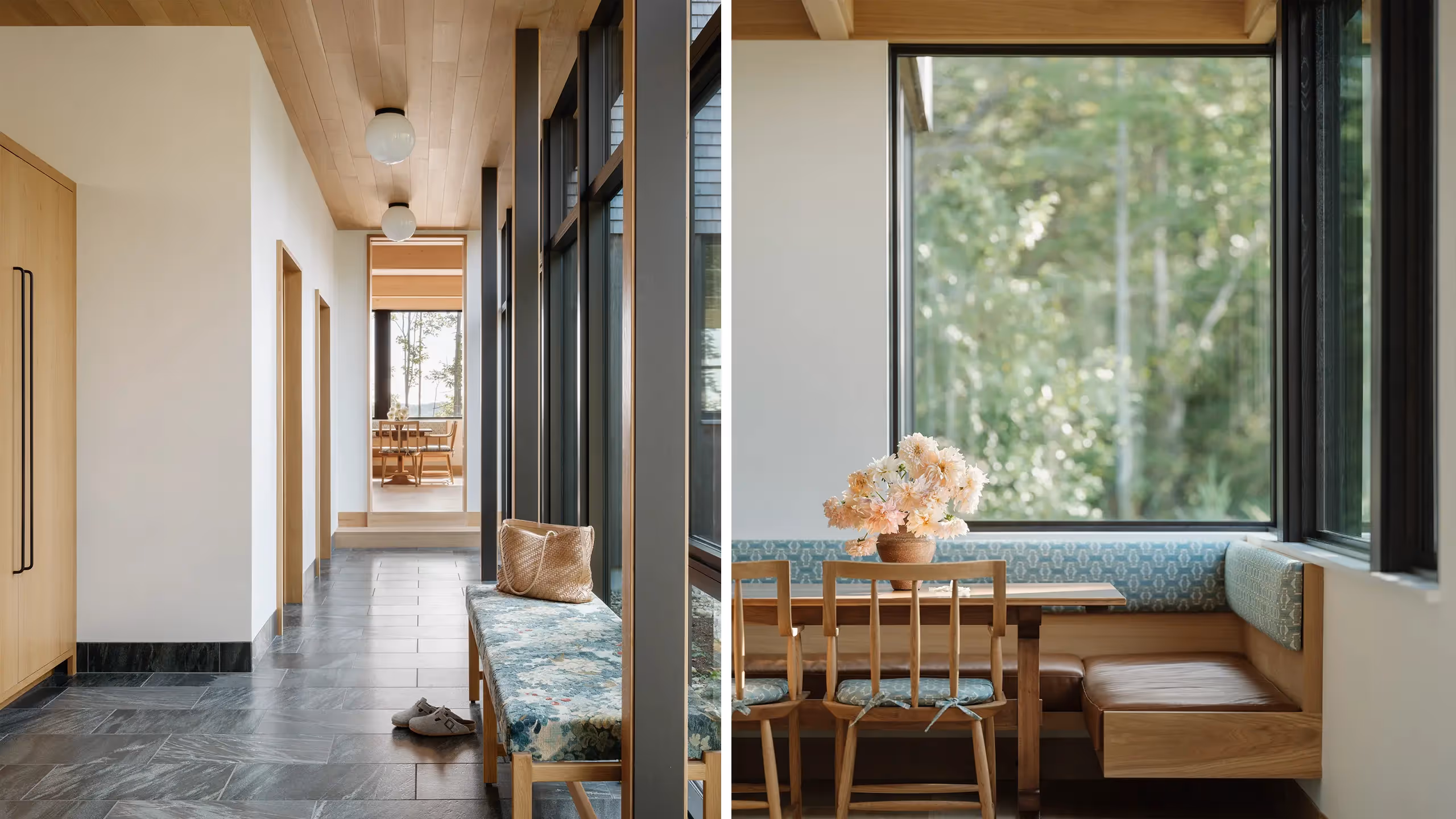 Minimalist interior with wooden bench, floral print, and large windows overlooking trees