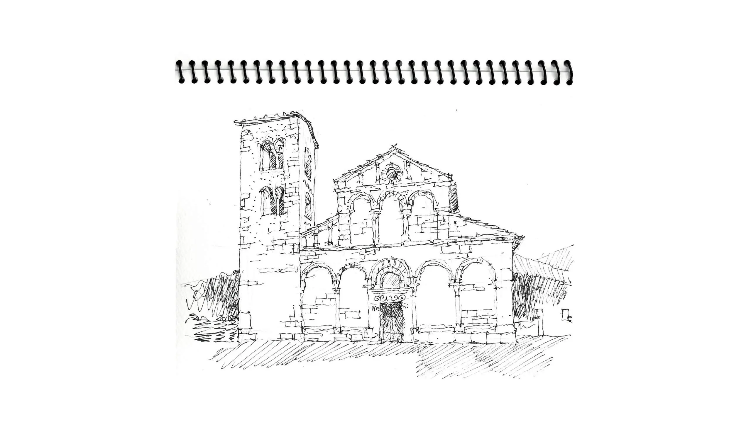 Hand-drawn sketch of an old stone church with arched windows and tower