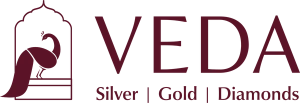 VEDA logo with stylized peacock and text 'Silver | Gold | Diamonds'.