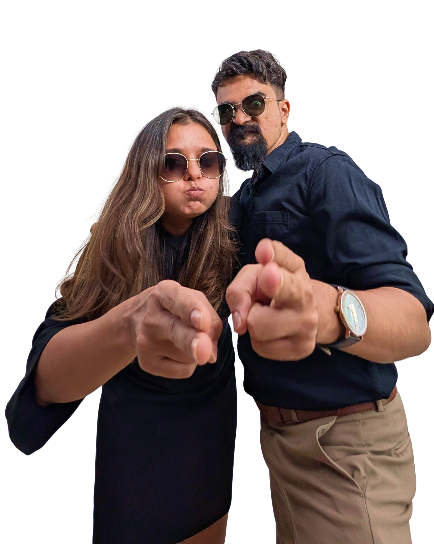 Rohit Dhongade and Anisha Khiyani, founders of Mellow Staffing, pointing at the camera