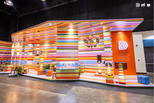 A colorful striped wall with lightsAI-generated content may be incorrect.