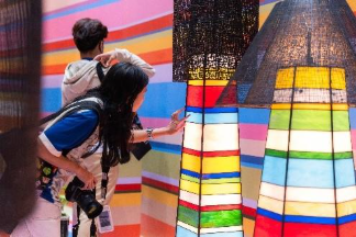 Two people looking at a lampAI-generated content may be incorrect.