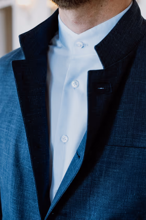 details blauw kostuum
