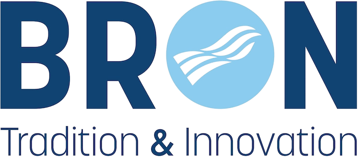 Logo de Bron avec un cercle bleu clair et le texte Tradition & Innovation dessous.