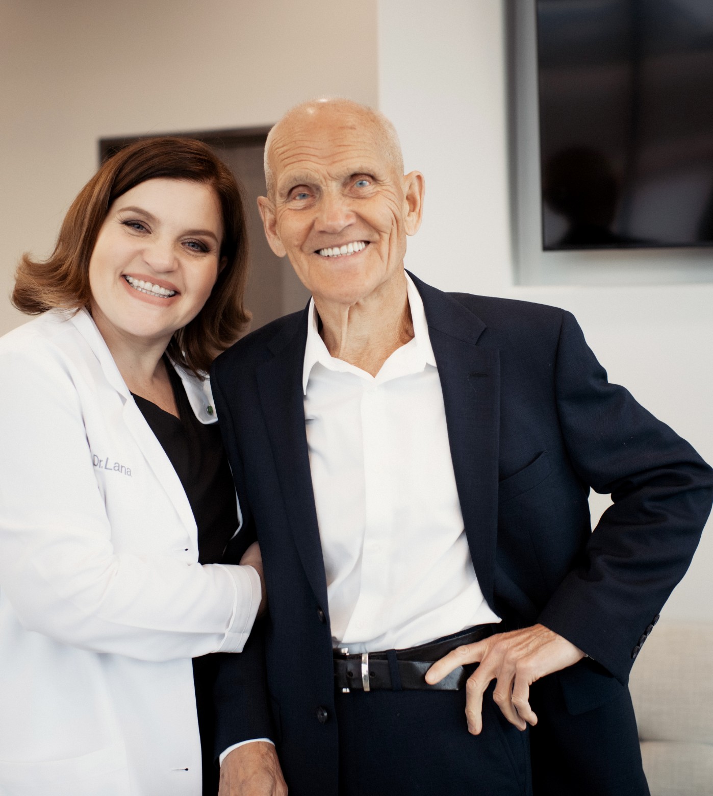 DR SVETLANA USHERENKO smiling with male patient
