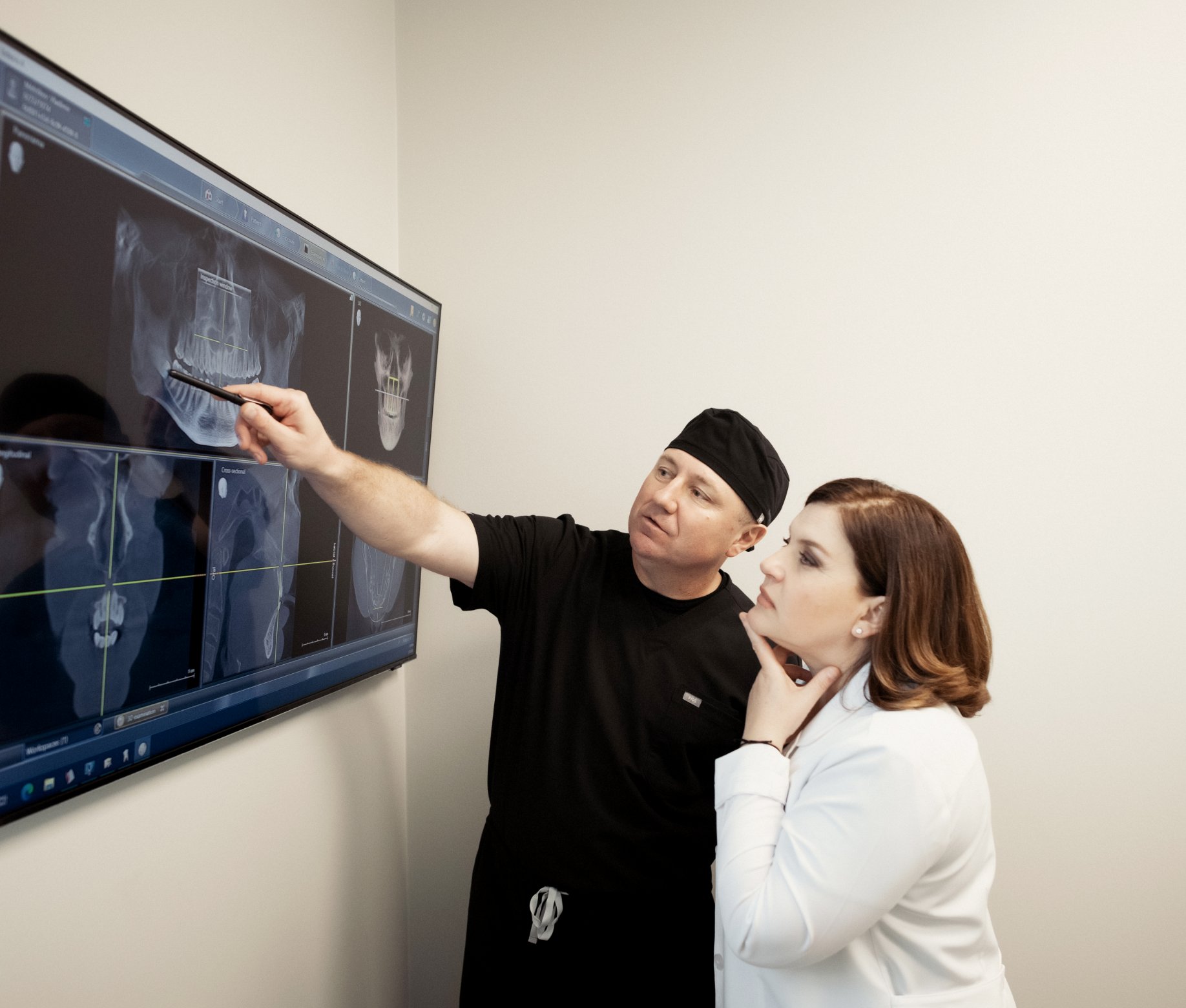 Dr SVETLANA USHERENKO and  Dr VLADIMIR MELNIKOV looking at a patient x-ray 