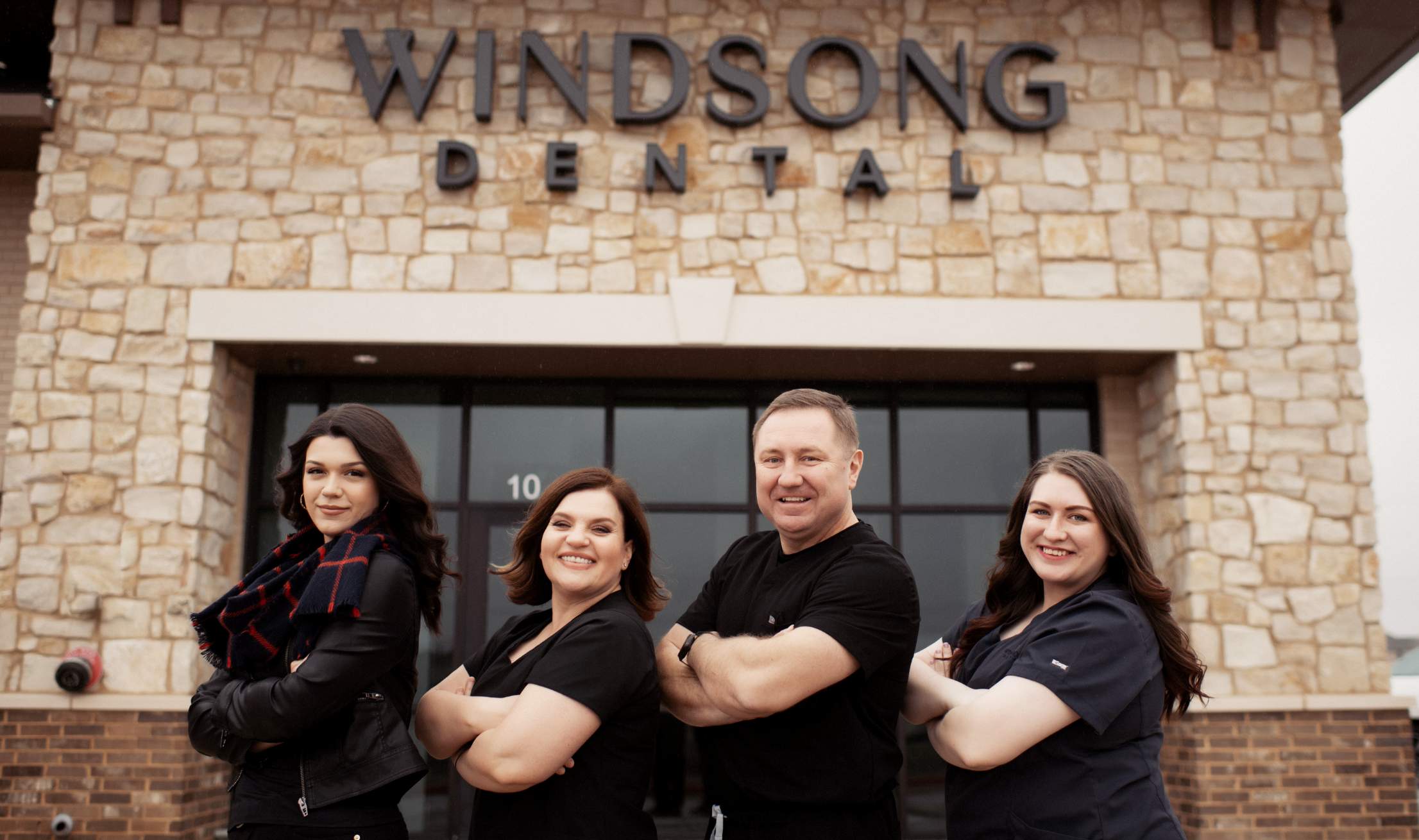 Windsong Dental Team outside the office smiling