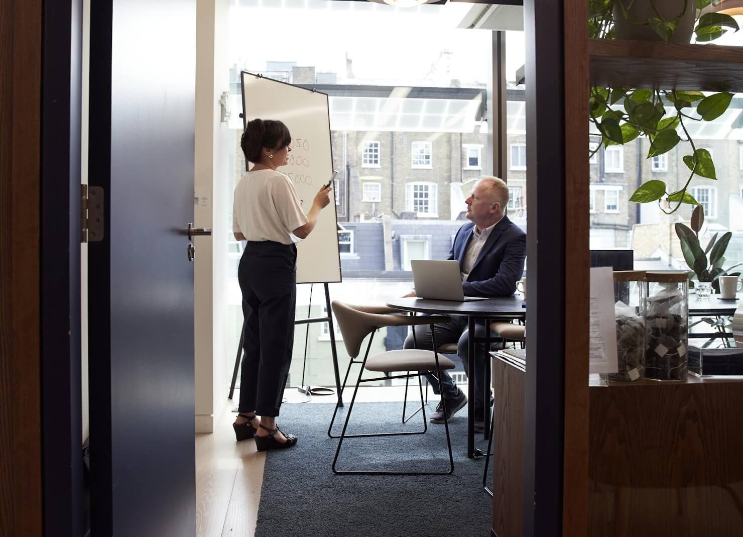 Employees participating in an on-the-job training session
