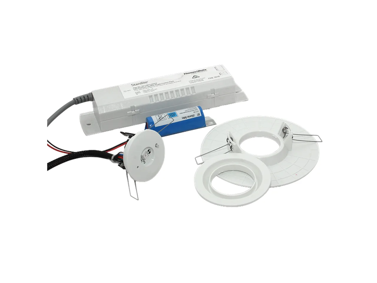 White recessed emergency downlight kit beside its separate battery and driver control pack