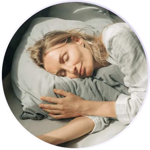 woman sleeping on a bed with pillow