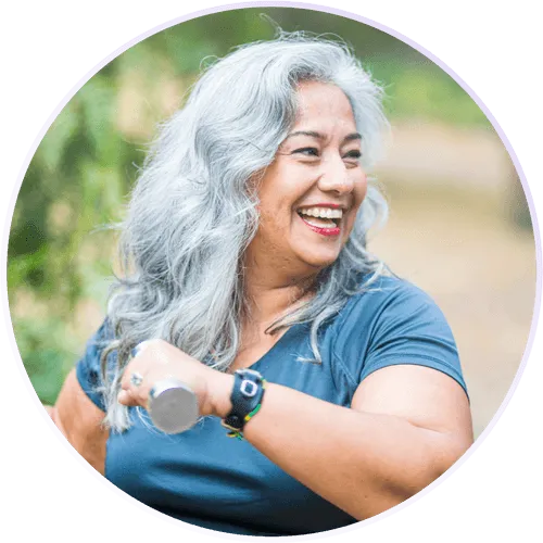 a smiling woman with a watch