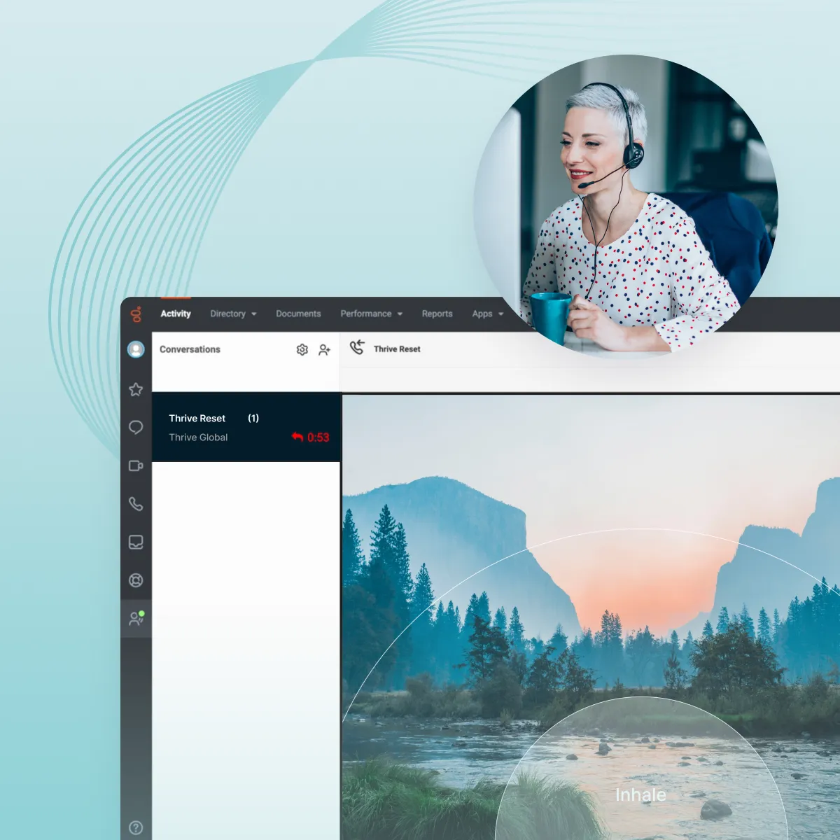 Smiling woman with short gray hair wearing a headset and holding a blue mug, overlaid on a computer screen showing a serene nature scene with trees and a river.