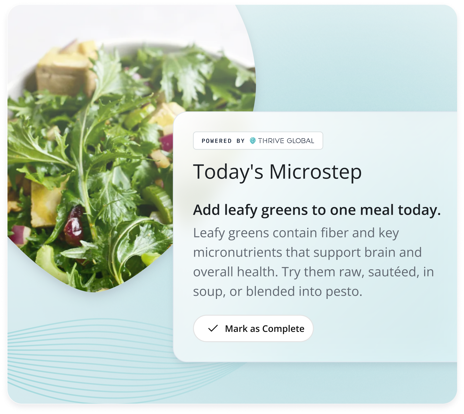 A wellness tip card powered by Thrive Global titled 'Today's Microstep' advising to add leafy greens to one meal today, highlighting their fiber and micronutrients that support brain and overall health, with suggestions to eat them raw, sautéed, in soup, or blended into pesto, alongside a close-up image of a salad with leafy greens, tofu, celery, and cranberries.
