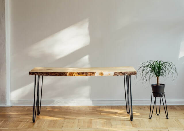 brown wooden table with white table cloth