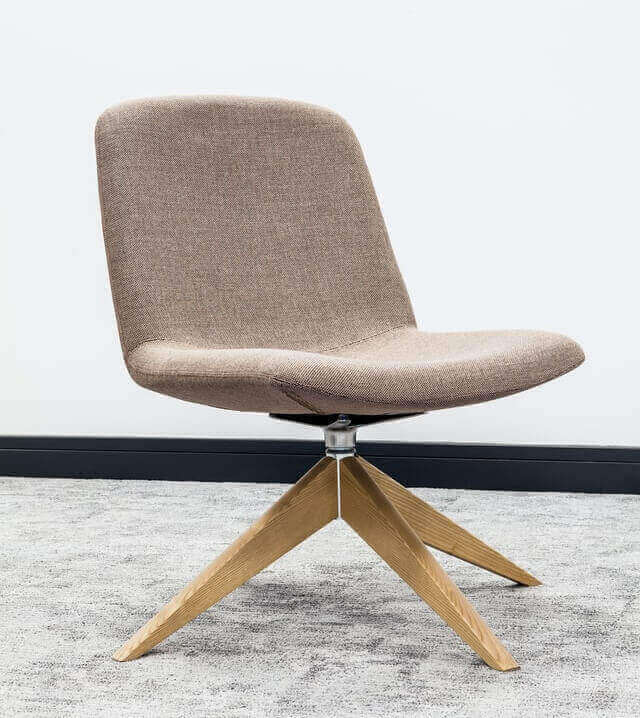 brown wooden framed gray padded chair