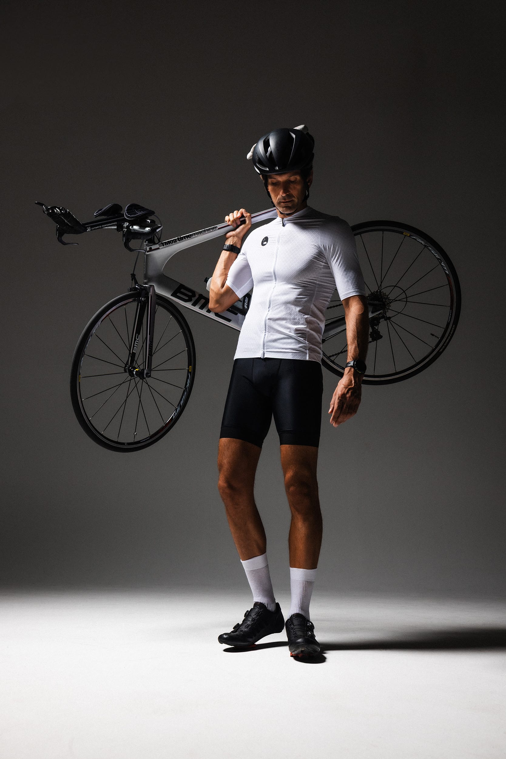 Athletics - Cycling Holding Bike