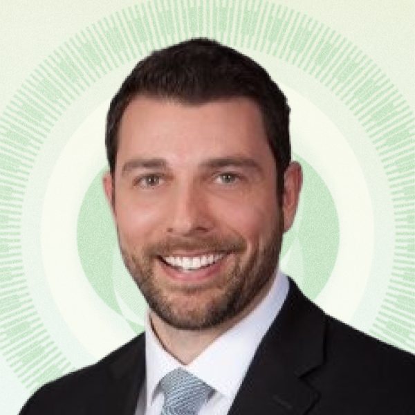 Headshot of Managing Director Daniel R. Gilham against tan background
