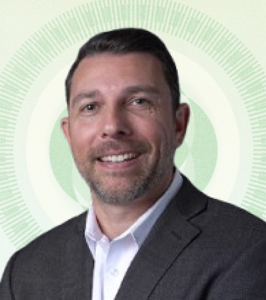 Headshot of Managing Director Daniel R. Gilham against tan background