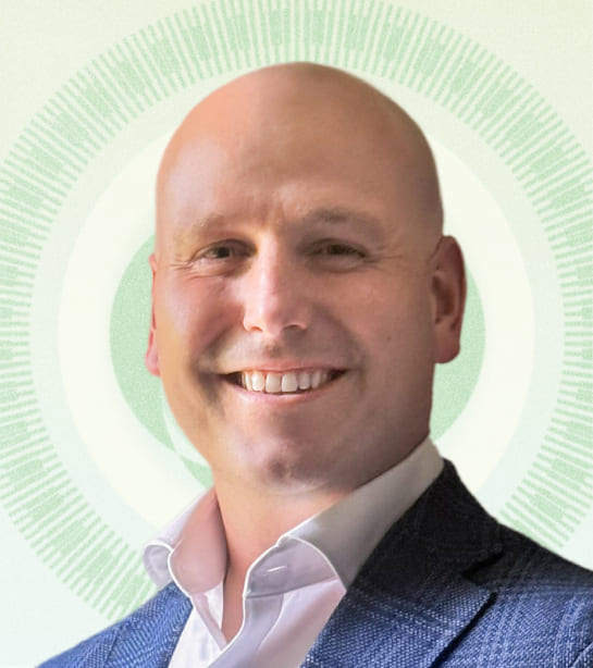 Headshot of Managing Director Daniel R. Gilham against tan background