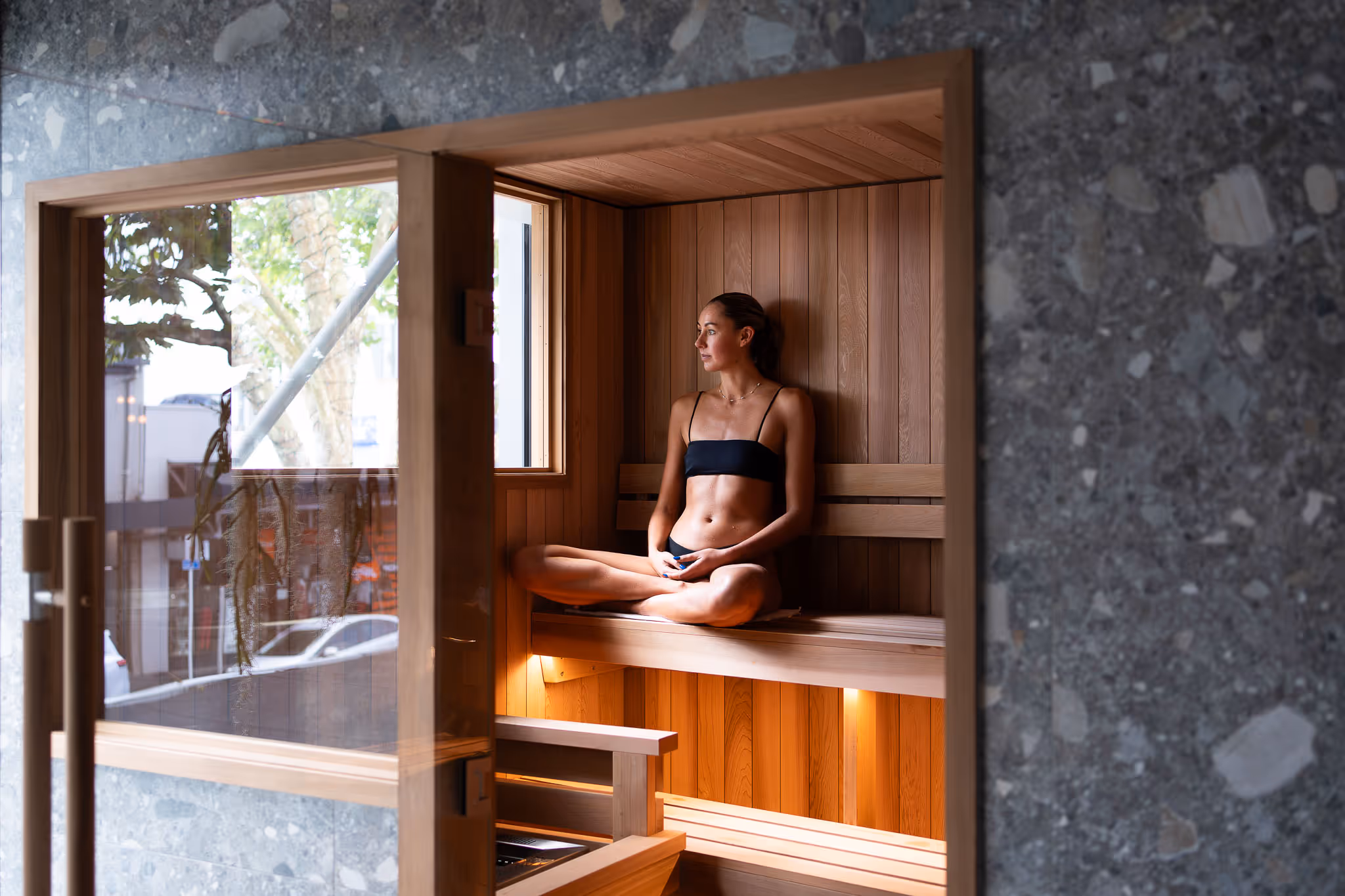two men sitting in O-Studio Remuera's infraredsauna