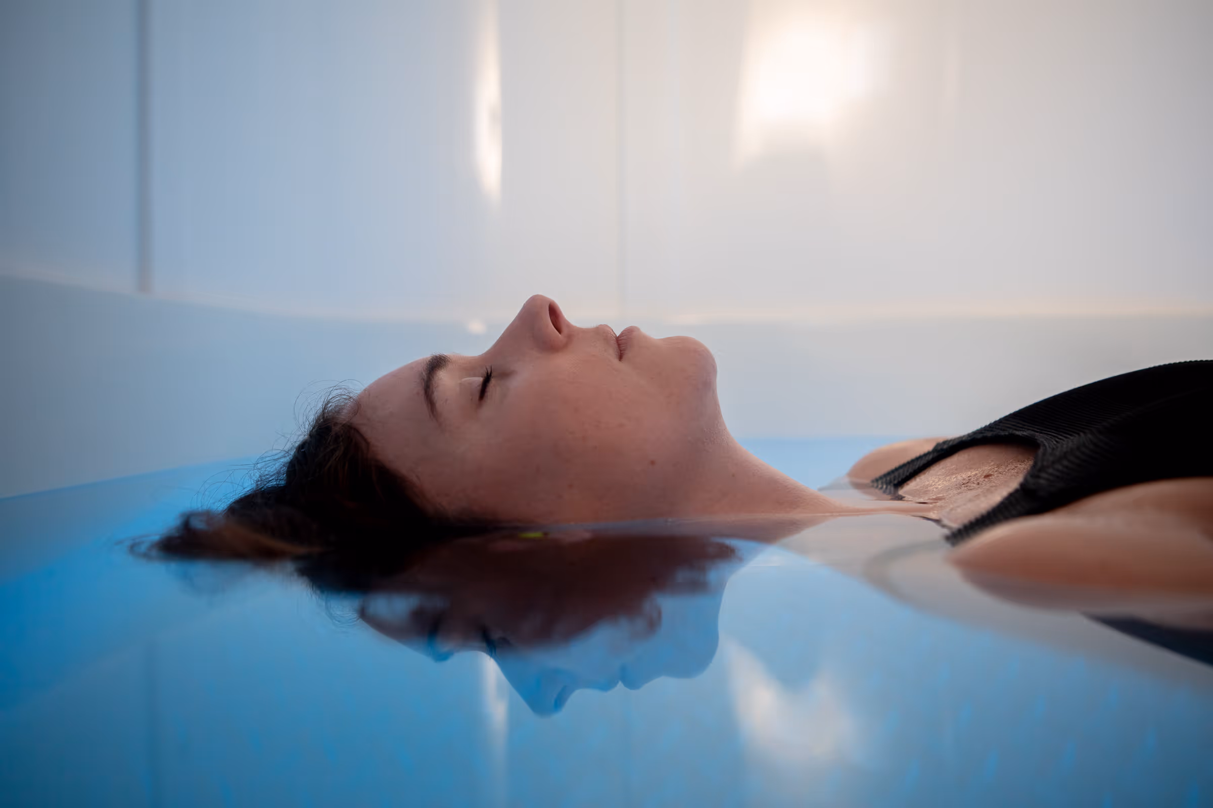 Women sitting in O-Studio Remuera Communal Sauna