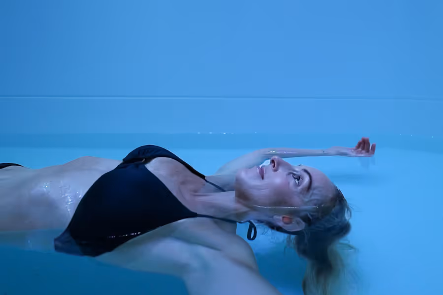 Women sitting in O-Studio Remuera Communal Sauna