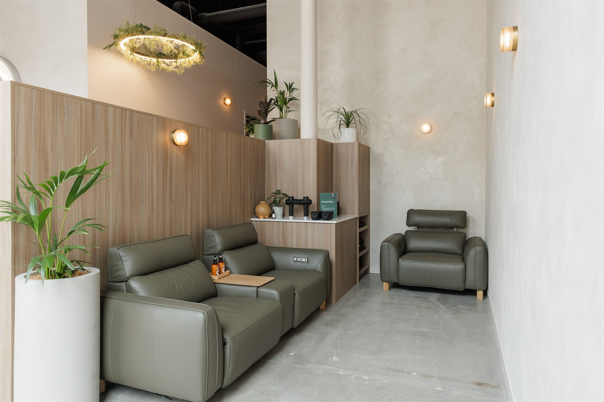Women sitting in O-Studio Remuera Communal Sauna