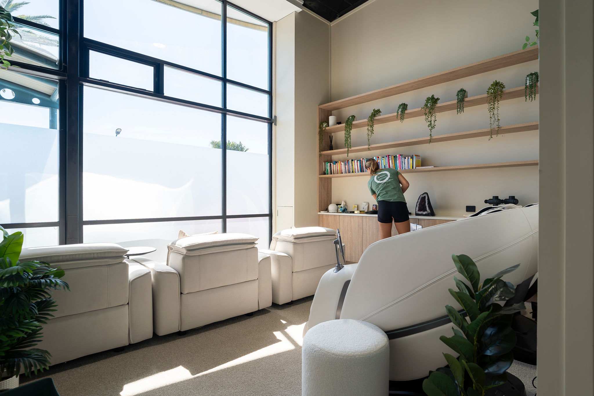 Women sitting in O-Studio Remuera Communal Sauna