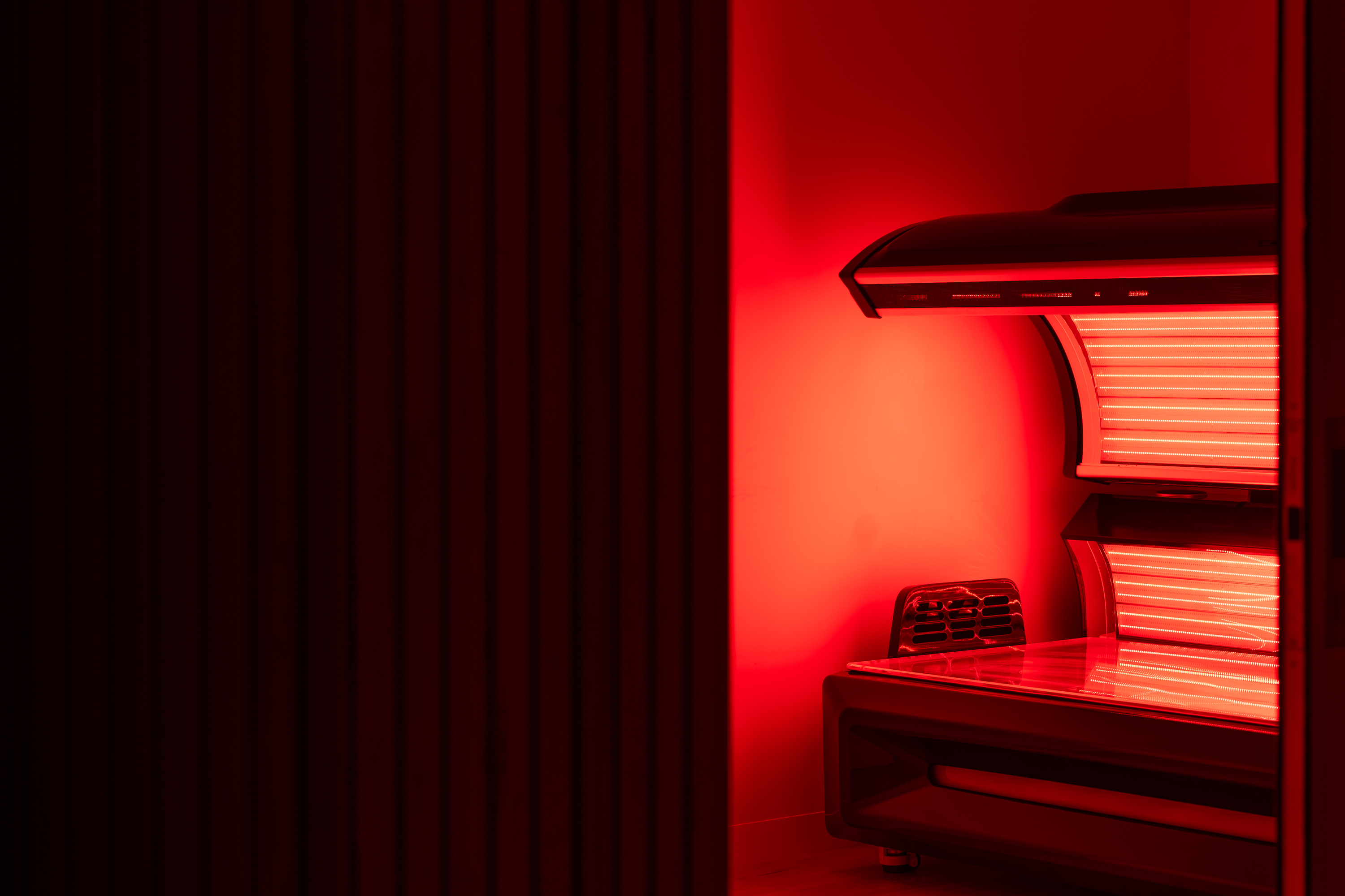 Women sitting in O-Studio Remuera Communal Sauna