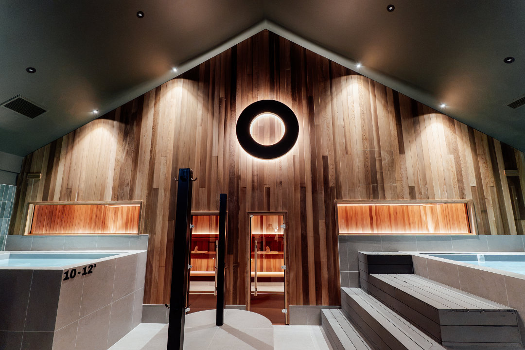 man and woman in sauna