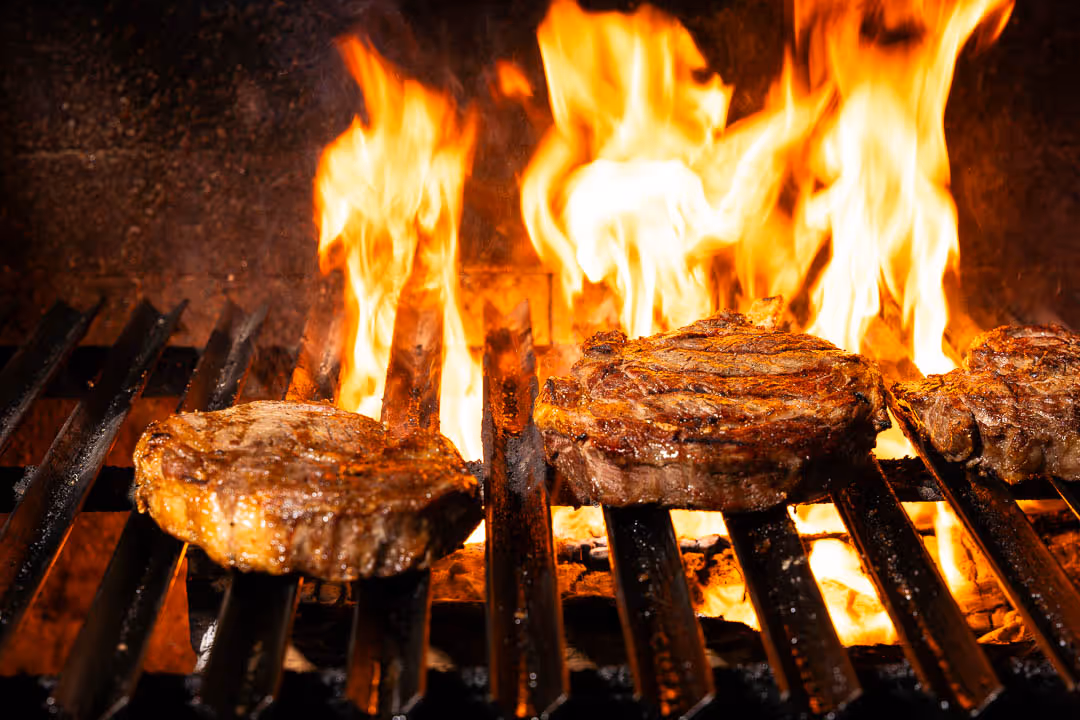 Tomahawk steak dinner with sauteed greens